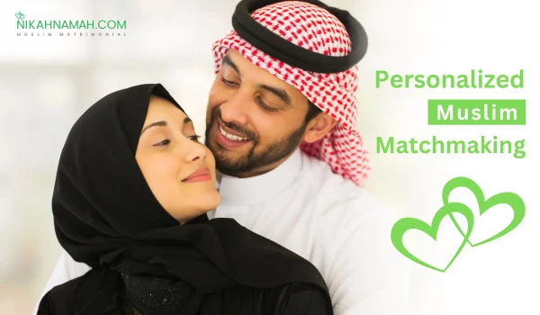 A happy Muslim couple dressed in traditional attire, smiling at each other. The woman is wearing a black hijab, and the man is wearing a white thobe with a red and white keffiyeh. The text "Personalized Muslim Matchmaking" is displayed in green, along with the logo of Nikahnamah.com, a Muslim matrimonial service. Two interlocking green heart icons symbolize love and connection.